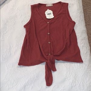 Rust colored altard state tank